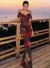 2024 Boho tryck kall axel semester strandklänning kvinnor sommarkläder sexig se genom spaghetti strap party klänningar a1143 240506
