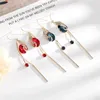 Boucles d'oreilles en peine-oreilles