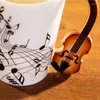 Tasses 2pcs Personnalité de la coupe en céramique Tasse un cadeau d'instrument de musique unique - Note de poignée de violon