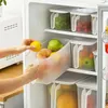 Bouteilles de rangement Boîte de réfrigérateur avec poignée carrée carrée à un seul couvercle transparent scellé et bac d'organisateur transparent