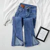 Jeans pour femmes streetwear élastique en denim pantalon femmes hautes taille vintage divisé coréen borne inférieur printemps