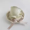 Tasses Saucers Nouvelles tasses à thé de thé et de soucoupe en porcelaine en céramique 250 ml tasse de café avec ruban coloré pour le mariage et la fête de café de fête