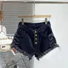 Dames shorts Buckle-breasted a-vormige hoog getailleerde denim voor vrouwen 2024 Zomer slanke ultra-short kwastje