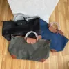 Torba designerska Wysoka wersja z zaszyfrowaną nylonową torbą na pierogi dla mężczyzn i damskiej torby podróży duża pojemność bagażowa torba ręczna