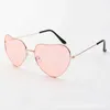 Nouveau métal à la mode Love Ocean Glass Sunglasses Peach Heart Womens Advanced Shaped