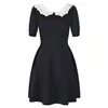 Summer Black Contrast Color Ribbon Tie Bowknot Dress Kort ärm Peter Pan Neck Panelerade korta avslappnade klänningar Y4W09233001