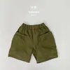 Byxor 2024 Summer Childrens Pants for Boys and Girls Casual Pocket Work Shorts Baby Western Korean Edition