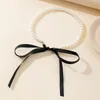 Salicon coréen imitation romantique perle coude coude couker mode noir velours collier arc à arc