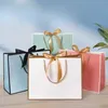 Enveloppe-cadeau 10 pièces / lot de haute qualité et belles sacs-cadeaux roses boîtes de pyjama décoratifs Poirées noires avec rubans papier Cowhide Packagingq240511