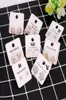 100pcslot 4x4cm carta colorata bianca diversa design colorato per aderente a pericolo di gioielli etichetta tag tag 7020155