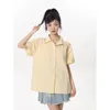 البلوزات النسائية النسخة الكورية قميص قصير الأكمام لصيف 2024 ركاب غير رسمي فضفاضة طوق البولو لون واحد الصدر