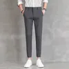 Pantalon masculin 2024 Printemps et été coréen Businet Fashion Casual High Pocket Slim Fit Couleur solide Small Pied