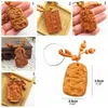 Dekorativa figurer Peach Wood Carving Chinese Dragon Lucky Staty Pendant Buckle Keychain Keyring Home Decoration Accessories