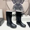 Chanells Shoe Channel Womens märkesgummi Rain Boots Lås C Pull On Booties Shoes Luxurys Designer Waterproof Jelly Tpu Water Shoe Mid High Ankle Boot Gard