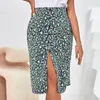 Jupes 2024 Femmes Summer Emballé Vêtements de vacances à la plage taille haute imprimé floral divisé de jupe midi décontractée femme sexy