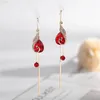 Boucles d'oreilles en peine-oreilles