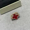 2024 Classic Four Leaf Grass Nouveau anneau laser Agate rouge double fleur en or rose 18K