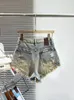 Dames shorts Buckle-breasted a-vormige hoog getailleerde denim voor vrouwen 2024 Zomer slanke ultra-short kwastje