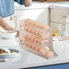 Kök förvaring transparent kylskåp automatiskt rullande äggställhållare 4 nivåer Box Rolling Basket Container