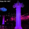 Decorazione di colonne gonfiabili a terra promozionale all'ingrosso con luci a LED e soffiatore d'aria libero per eventi o palcoscenici realizzati in Cina