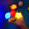 Baby schattig dieren Bad speelgoed Zwemwater LED Licht speelgoed Soft Rubber Float Inductie Lumineuze kikkers voor kinderen spelen grappige cadeaus 240510