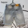 Mens Korean style ripped personalized inner lining washed denim shorts summer stitching five-point jeans 240511