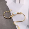 Nouvelle mode Gold Bead Femmes Chaîne de serpents en acier inoxydable Blue Evil Eyes Bracelet pour les femmes