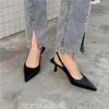 Chaussures habillées comémore 2024 Black White Pumps Summer Summer High Heels Band Elastic Ladies Party Party Mules pointues Toe Women Sandales