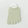 Chaussettes de femmes simples élasticité couleur solide mi-palmier cure de soins en intimes à cinq doigts séparateur