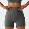 Shorts actifs Yoga Femmes Gym Vêtements d'entraînement avec recyclage de poche Portez un motard haute taille en cours d'exécution