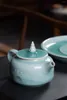 Ensemble de thé de thé à tasse de haute qualité chinoise traditionnelle sur xihu natural céramique céladon d'eau bouteille verte cadeau en porcelaine