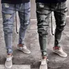 Trendige Jeans Neue graue perforierte elastische Reißverschlüsse Männer schlanker Hosen M513 53
