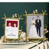 Frames Golden Alloy Po Modern Design Gold Plated Floral Framed Picture Frame TV Cabinet Desktop Decoration Family