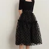 Jupes d'automne polka dot rétro plissé haute taille corps mince organza flatteur de jupe noire streetwear doux et élégant