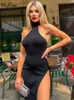 Basic Casual Dresses Hugcitar Halter Black Slveless Backless Slit Sexy Bodycon Maxi Prom Dress 2024 Spring Fashion Women Outfit Beach Vacation Club Y240509