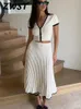 Patchwork en tricot 2 pièces Set Crop-top Top Maxi Aline Jupes Suit Matching Set 2024 Knitwear Slim Fit Pleed Pleed Turnits 240510