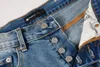 Purple dżinsy w stylu High Street Projektant mody męskie niebieskie kolano i wybielone dżinsy kreatywne liter
