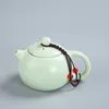 Ensembles de théâtre de thé Ensemble de thé vert chinois voyage une théière à quatre tasses de créateurs céramiques drinkwringe