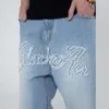 Trendiga och knubbiga överdimensionerade casual hiphop skateboardbyxor med fet kille lösa denim fett lårbyxor, mäns knubbiga jeans