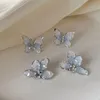 Personnalité Sweet Pearl Pendant Blue Crystal Zircon Butterfly Designer Moucles d'oreilles pour femmes Tendance de la mode