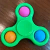 Anti-stress tournant nouveauté push bubble pop keychain fidget spinner compreindre le jouet sensoriel adulte