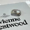 Бренда высокая версия Westwoods Light Luxury Unisex Line Saturn Saddle Ring для мужчин и женщин ногтя