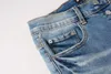 Purple dżinsy w stylu High Street Projektant mody męskie niebieskie kolano i wybielone dżinsy kreatywne liter