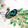 Broches Luxury Green Crystal Peacock Femmes ENAMEL RHINATONE Big Bird Party Office Animal décontracté épingles de broche