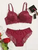 Bras setzt Viomisha sexy Dessous Set Lady Push Up Bras Set transparent Blumenunterdraht intim hübsches Spitzenunterwäsche Slip Set Y240513