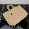 Sacchetta di paglia di lusso borse a triangoli designer borsetti per le donne tessitura da donna manico top borse da spiaggia shopper shopper clutch frizione maschile crossbody spally bagnn
