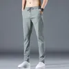 Pantalon masculin pantalon de soie de glace d'été Nouveau pantalon décontracté.