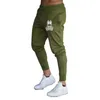 Pantalon masculin 2024 pantalon de survêtement mince des femmes Femme Fitness Workout Papant de survêtement Jogging Running Sweatpant Papant et automne Casual confortable Y240513