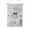 Sacs de rangement tissu poches suspendues murales sur le mur multicouche