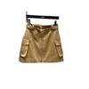 Skirts Designer Brand 2024 printemps / été Nouveau triangle étiquette de fer à zépper zipper Split Jirt Style de travail pour femmes Double poche à la mode courte BPF3